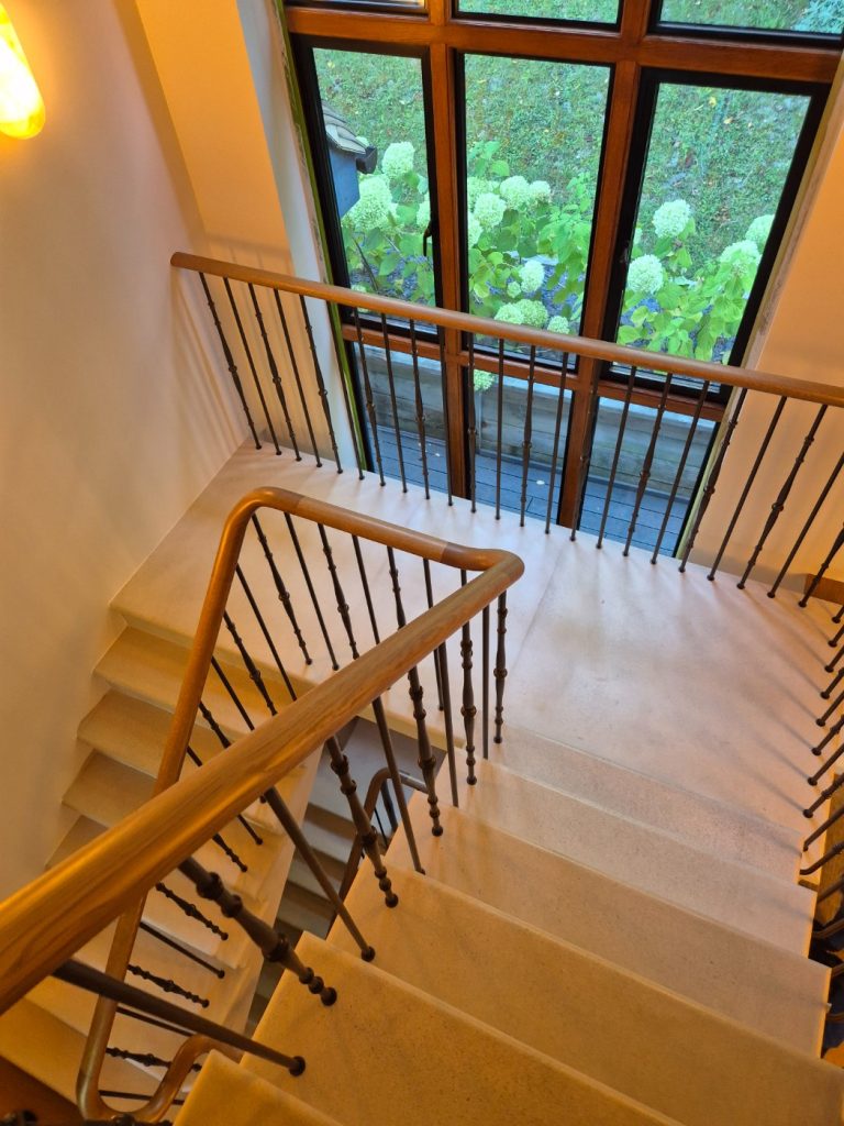 Understanding Your Wooden Handrail Tonal variation along a light-stained handrail run
